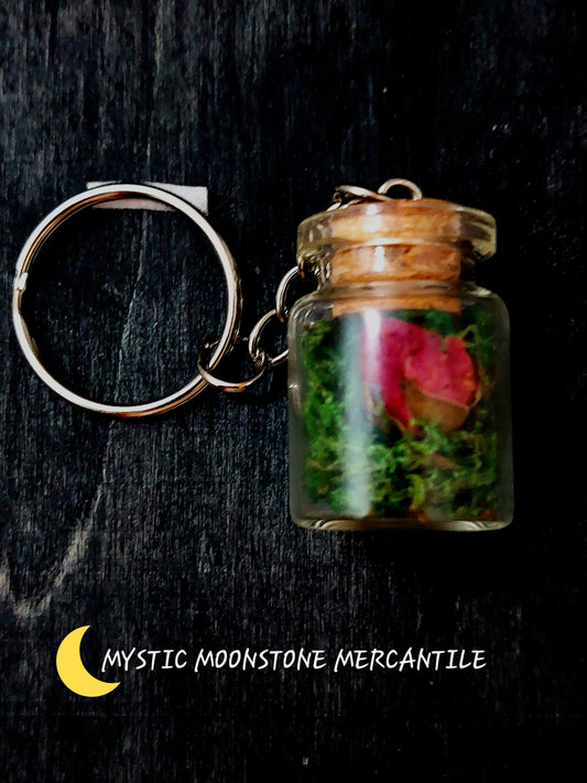 "LOVE"  ROSEBUD IN MOSS SPELL BOTTLE KEYCHAIN