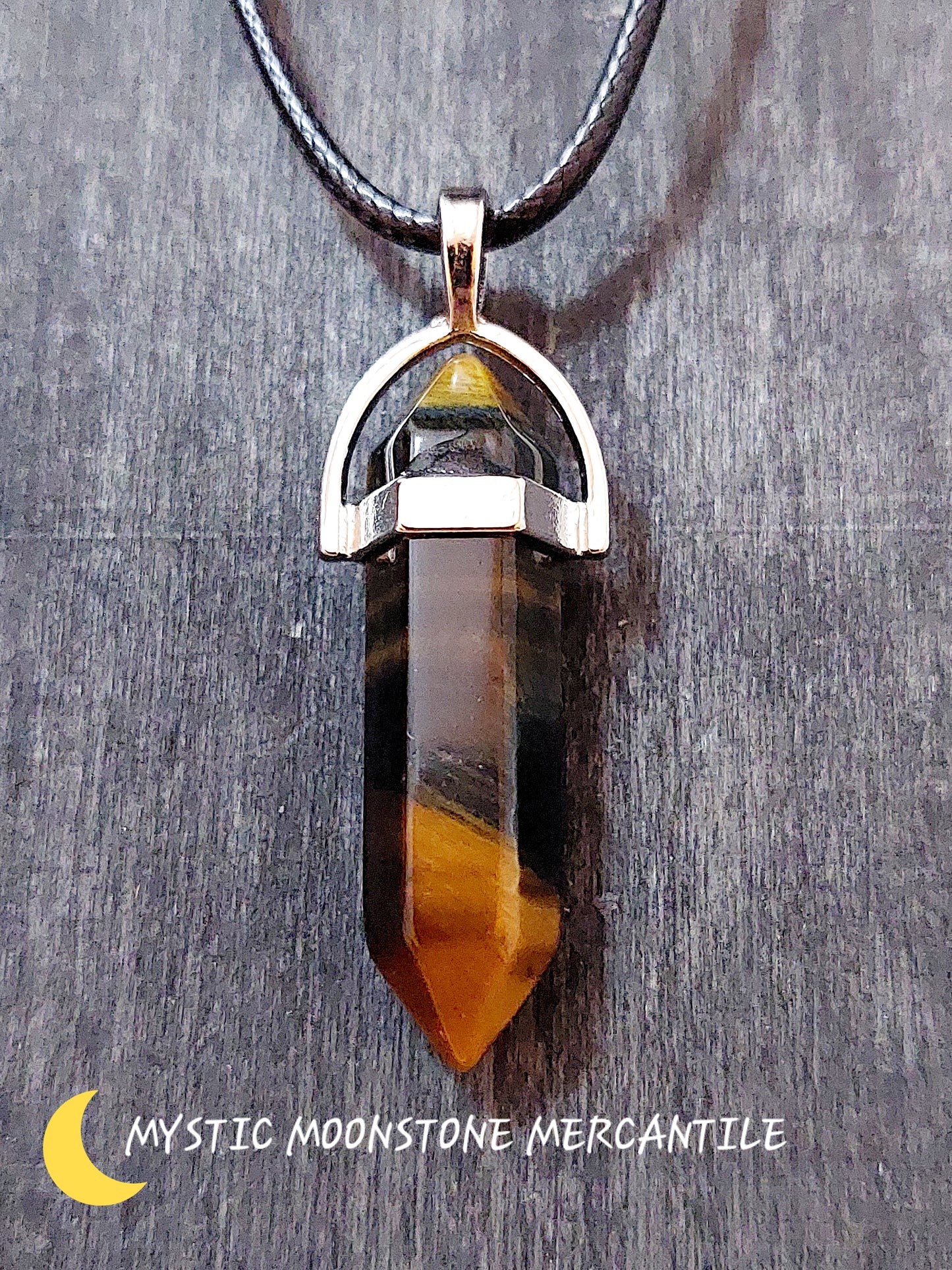 DOUBLE POINT TIGERS EYE PENDANT ON BLACK WAXED CORD