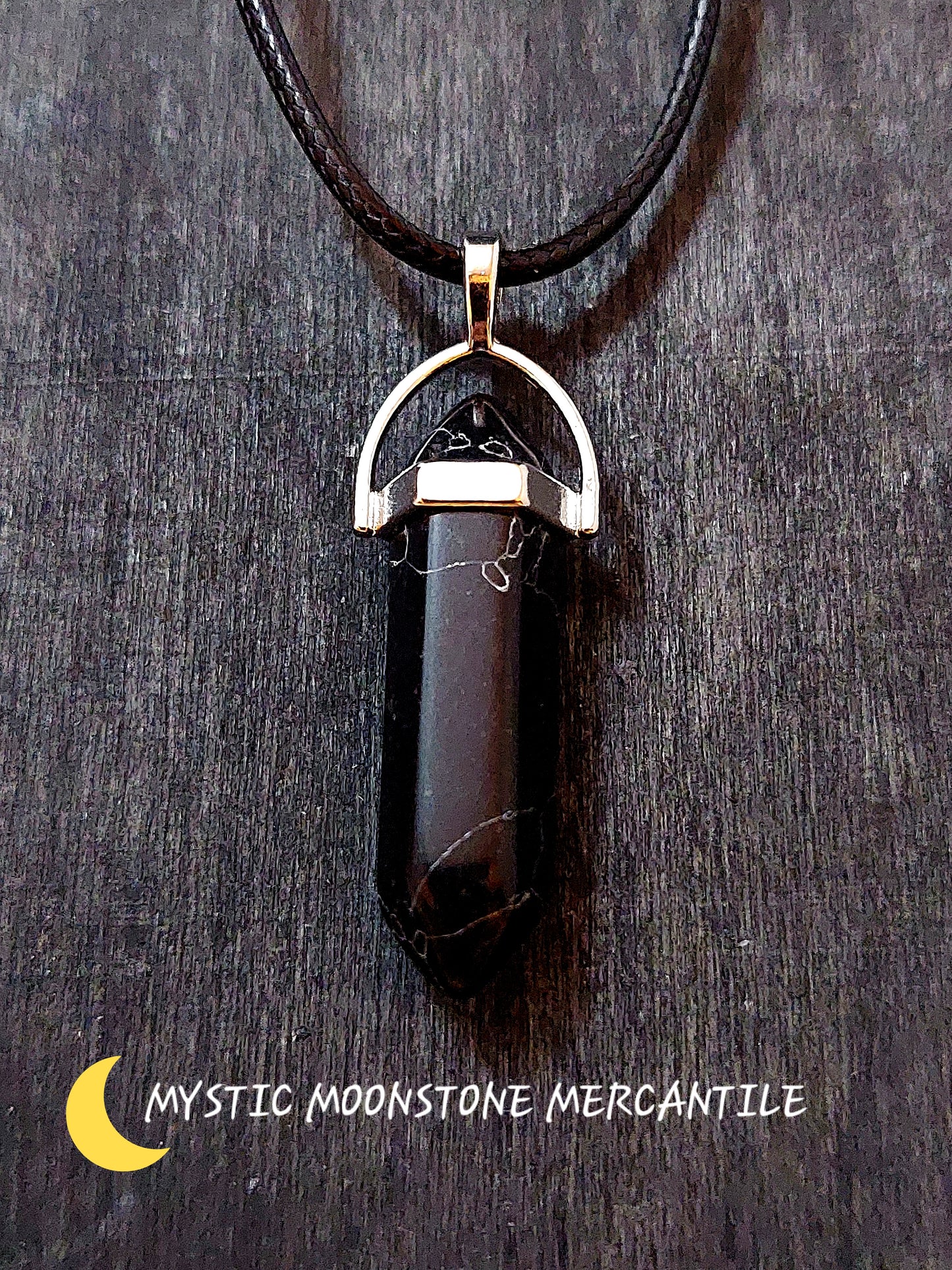 DOUBLE POINT BLACK ONYX  PENDANT ON BLACK WAXED CORD