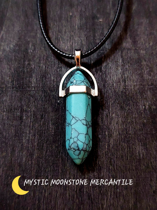 DOUBLE POINT BLUE HOWLITE  PENDANT ON BLACK WAXED CORD